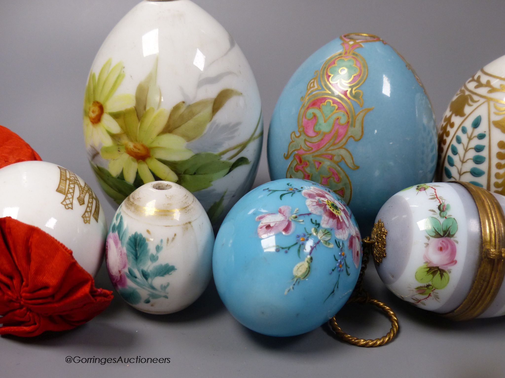 Assorted 19th/20th century Russian painted and gilded porcelain Easter eggs